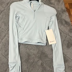 It’s Rulu Run Cropped 1/2 Zip Lululemon brand new size 0